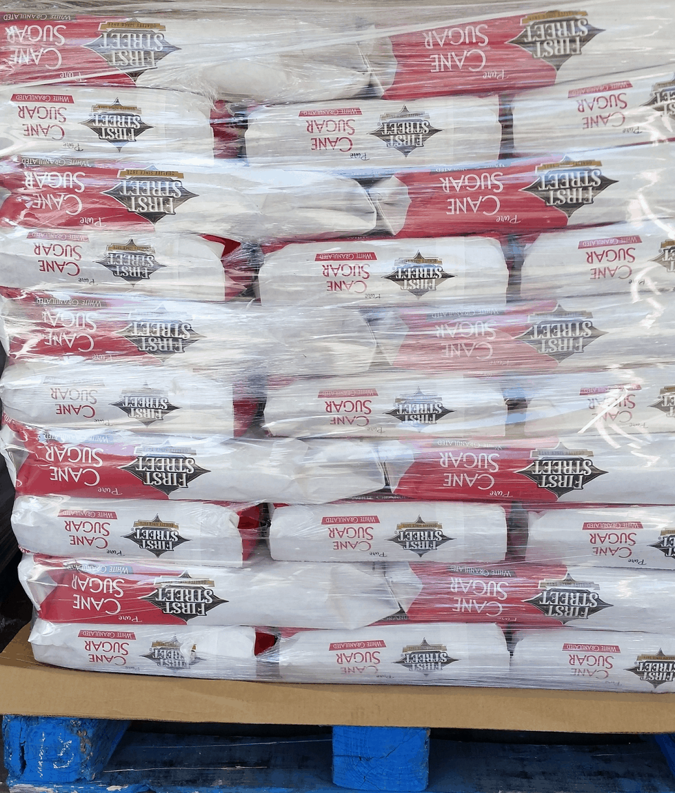cane sugar shrink wrapped over a wooden pallet