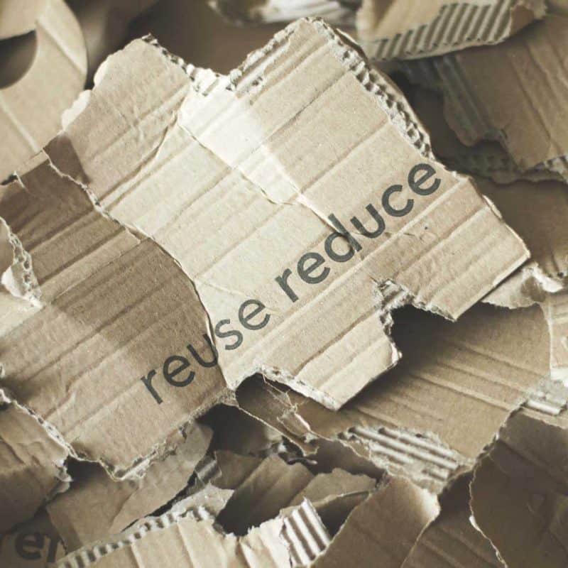 Shredded cardboard box with reuse reduce.